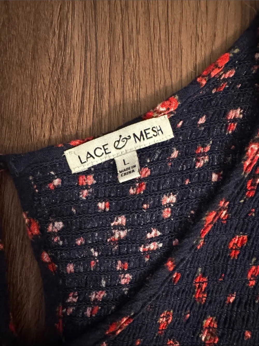Navy Sleeveless Midi Dress with Red Floral Print